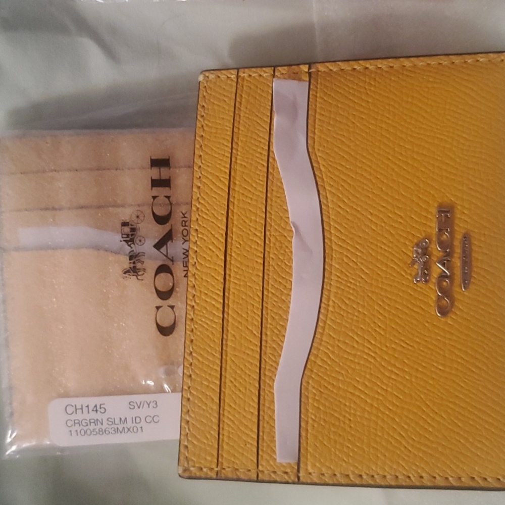 BNWT Authentic Coach Id holder $65-. OBO. Yellow 2 Left  Orange 1 Left - Picture 6 of 8